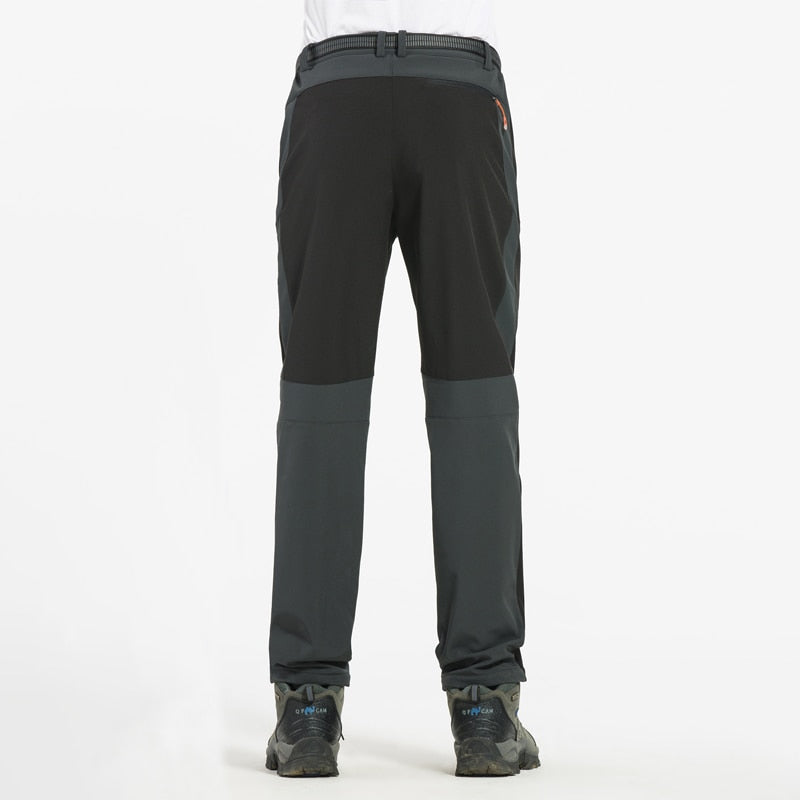 Varme, vanntette vinterbukser for menn. Softshell turbukser gir optimal beskyttelse mot kulde og fuktighet under aktivitet.