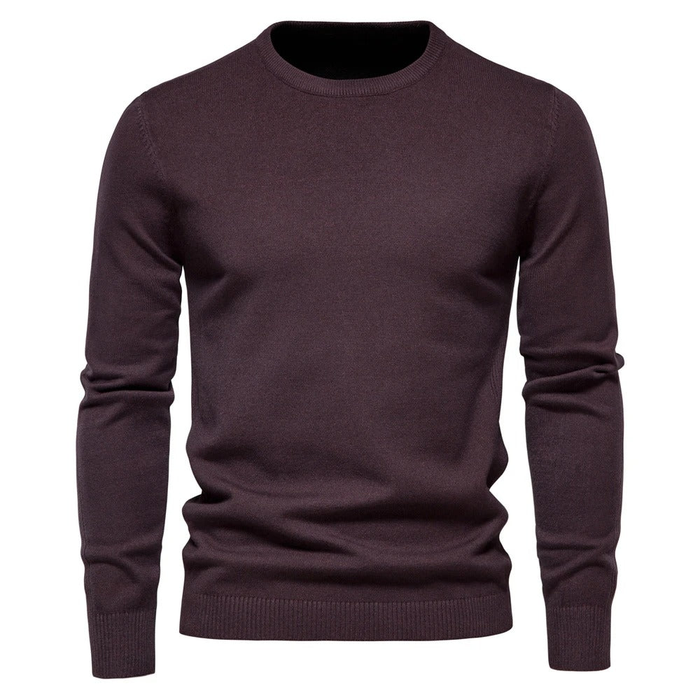 Nærbilde av tekstur på menns slim fit o-hals genser, viser kvalitet og varme.