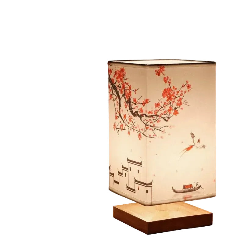 Minimalistisk bordlampe i japansk-skandinavisk design. Perfekt for stue eller soverom, med naturmaterialer.