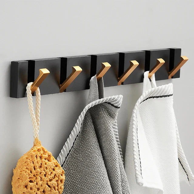 Rustfritt stål vegghook, holdbar og stilren. Sammenleggbar design for smart oppbevaring.