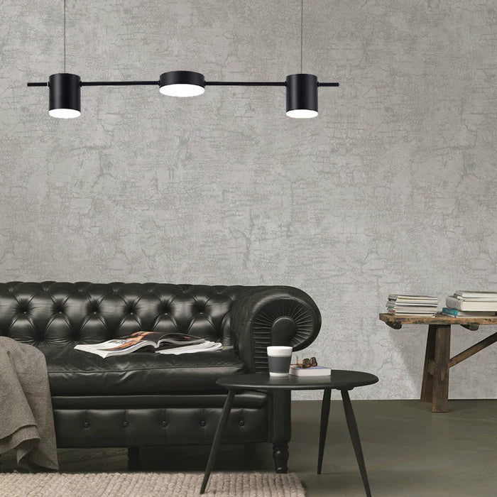 Skulpturell pendellampe i gull, en moderne LED-lampe som gir varmt stemningslys til hjemmet.