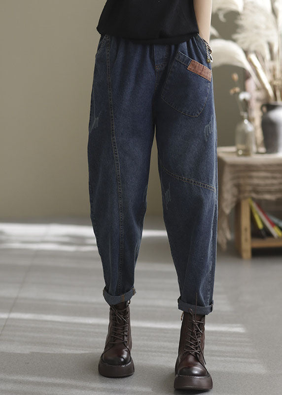 Løse damebukser i mørkeblått denim med elastisk midje. Perfekte vår- og sommerklær med lommer.