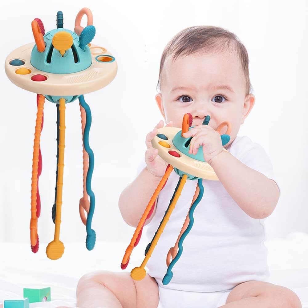 Myk og trygg silikon UFO trekkleke, ideell for babyens sensoriske utforskning og moro.