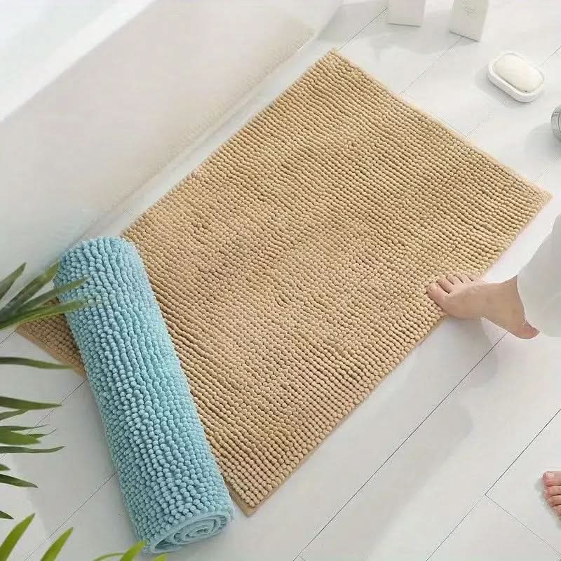 Blå myk sklisikker badematte for baderom. Maskinvaskbar og absorberende gulvmatte.