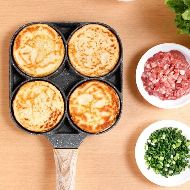 Grå nonstick eggpanne for induksjon, lager 4 perfekte egg samtidig. Enkel å rengjøre.