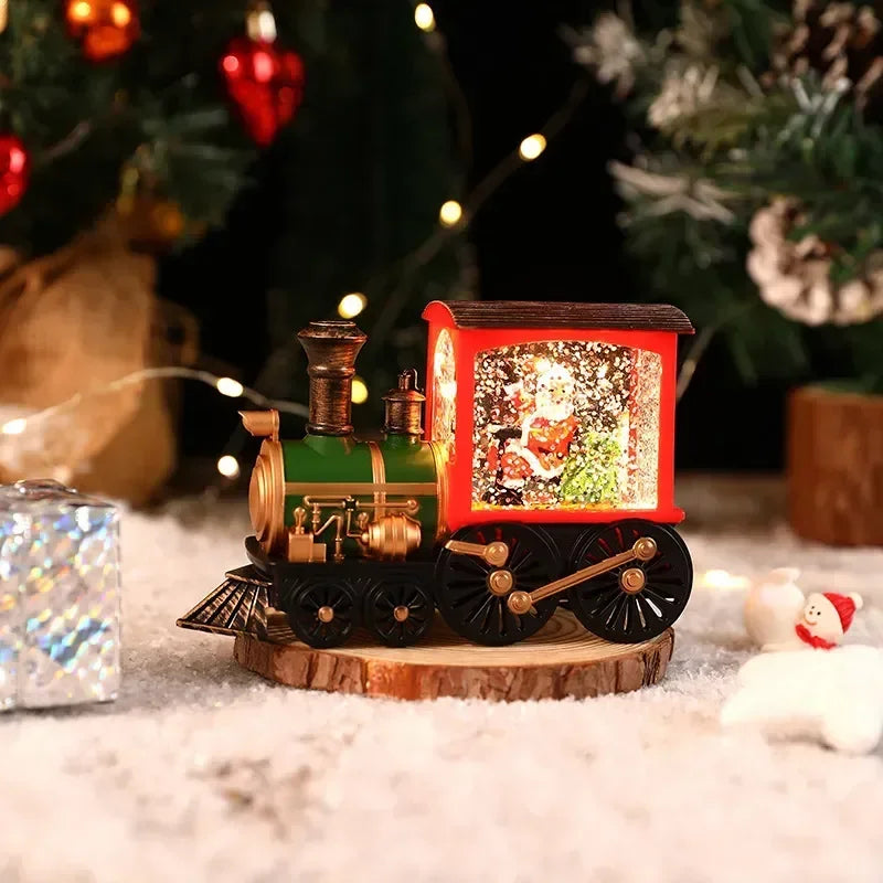 Detaljert juletog med vogn, opplyst av LED, og snøfnugg som faller. Perfekt julepynt.