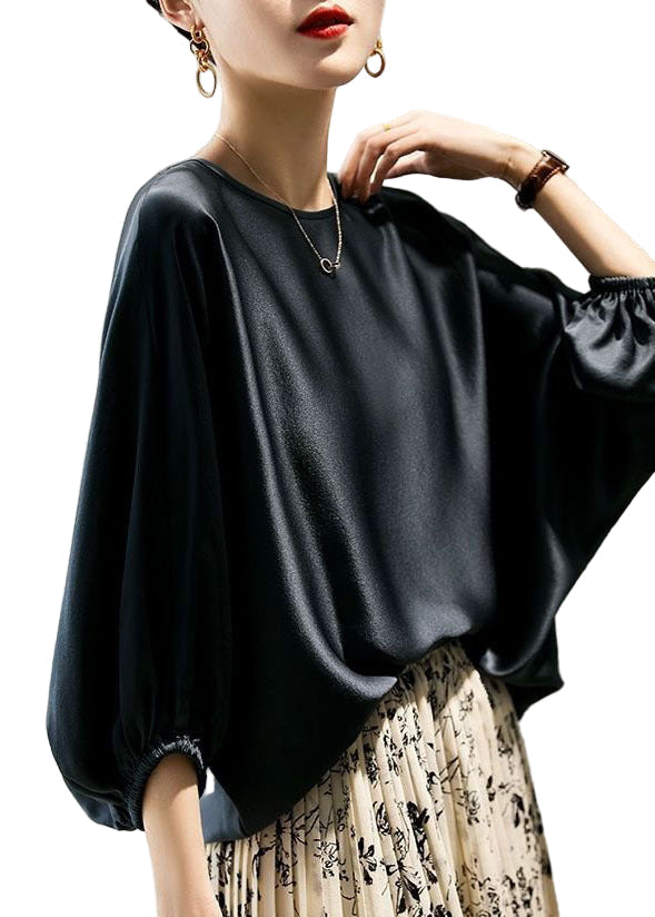 Oversized bohemsk O-hals bluse for kvinner. Løs passform, batwing-ermer, perfekt for casual vår- og sommerstil.