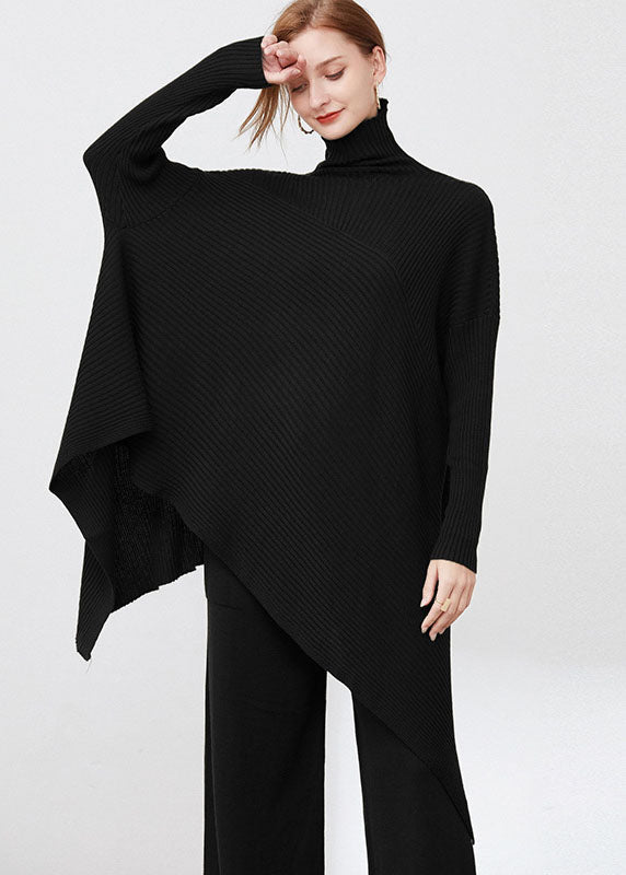 Elegant oversized damegenser med asymmetrisk kant, perfekt for høst og vinter. Langermet og casual stil.