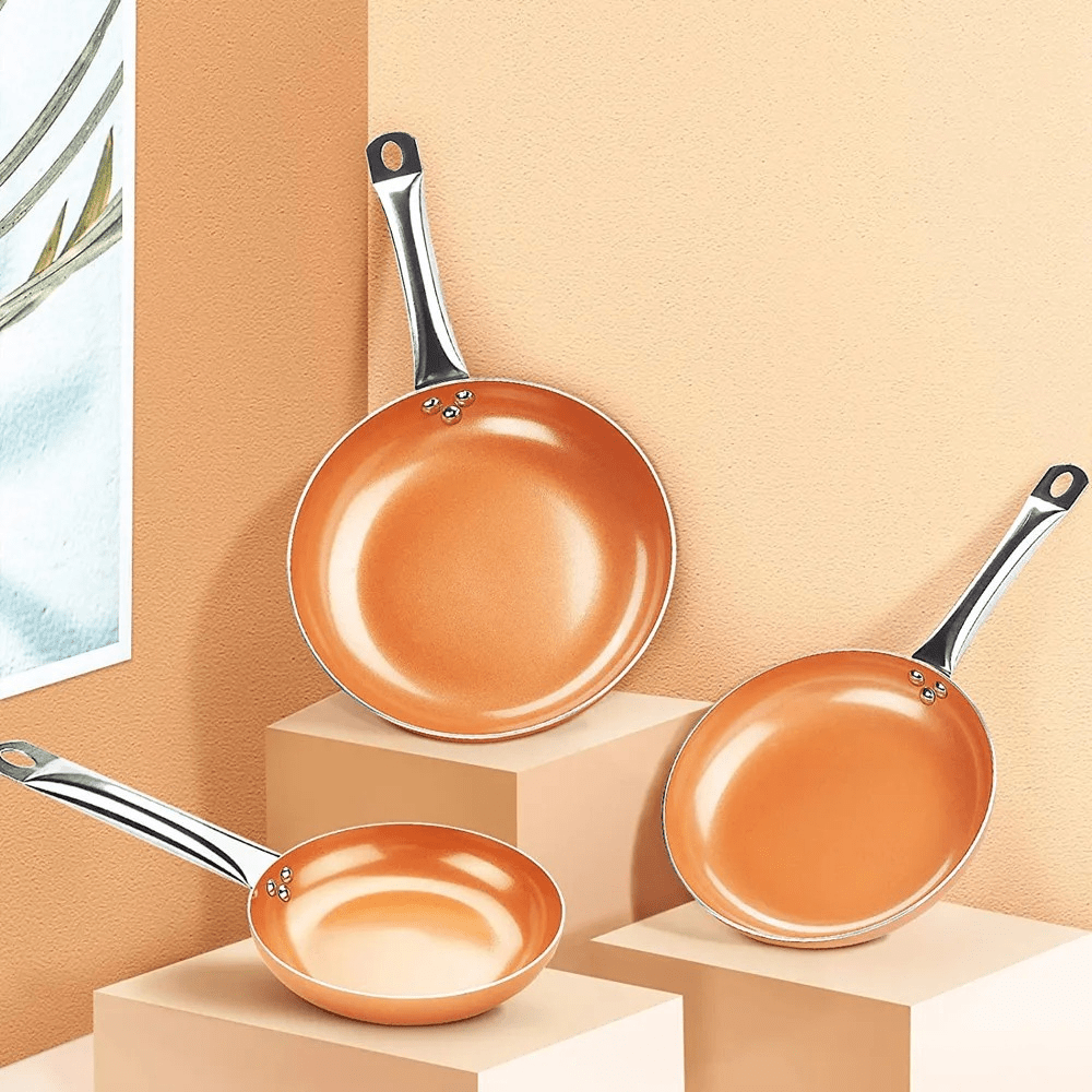 Slitesterk kobberpanne med non-stick overflate, perfekt for induksjon og allsidig matlaging.