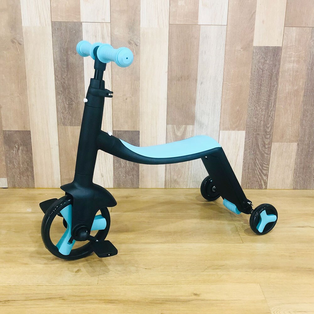 Allsidig 3-i-1 barnescooter i rød, blå og gul. Kan brukes som balansesykkel og sparkesykkel for barn.