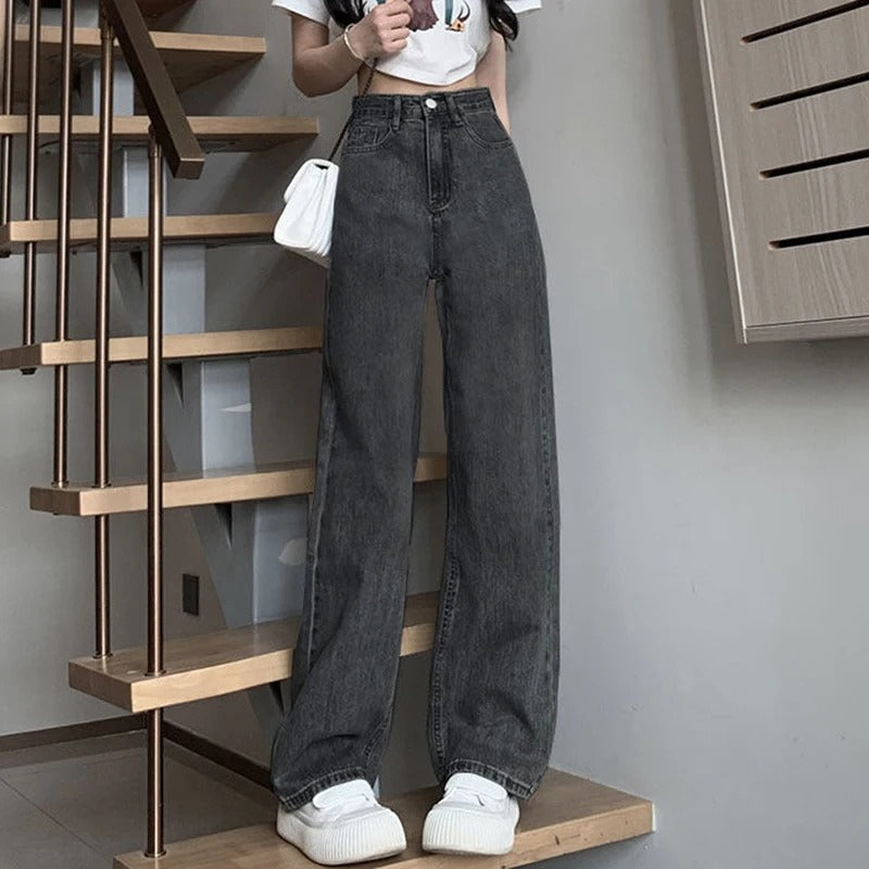 Damemote jeans: Vide ben, høy midje og retro-detaljer for en chic og avslappet stil.