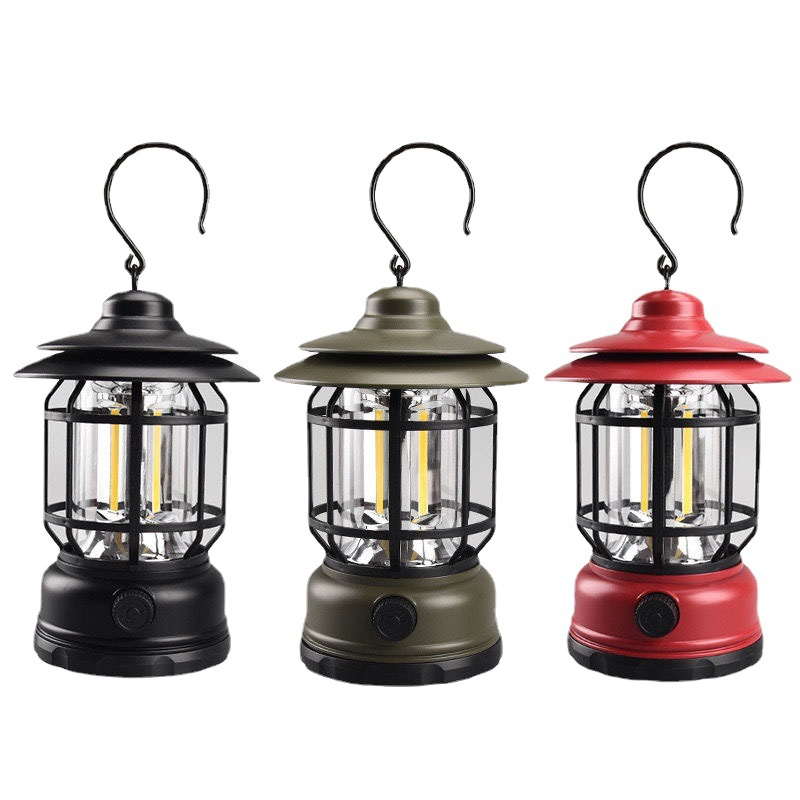 Bærbar retro LED-lampe i mørk farge, ideell for utendørs dekorasjon og koselig kveldslys.