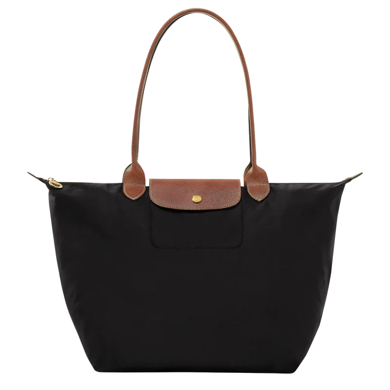 Elegant dameveske/tote bag i PU, romslig design med justerbar stropp. Ideell som arbeidsveske.