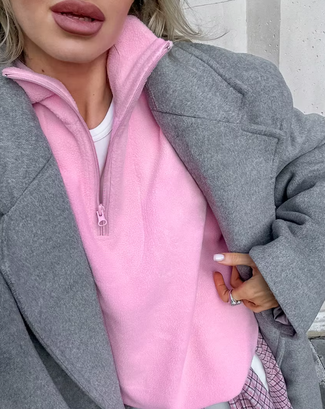 Hverdag genser i mykt stoff for kvinner, rosa med moderne glidelåsdetalj.