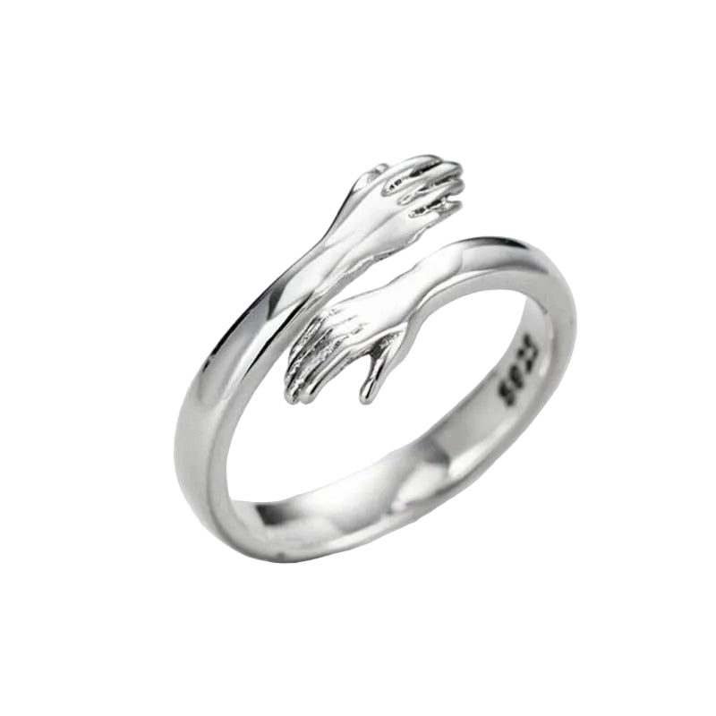 Sølv klemring for kvinner med justerbar design, symboliserer evig kjærlighet og trygghet.