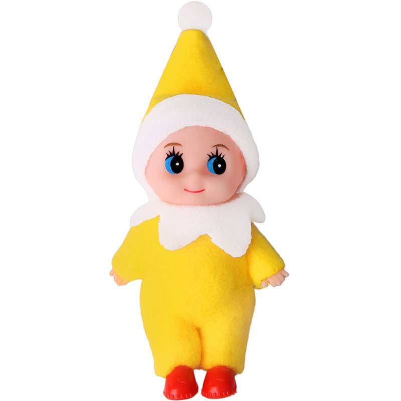 Whimsisk julebabydukke, sprer juleglede og god stemning blant barn.