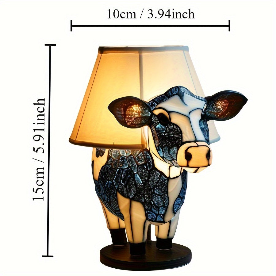 Unik bordlampe formet som en søt ku, egnet for både barnerom og stue. Koselig lys og dekorasjon.