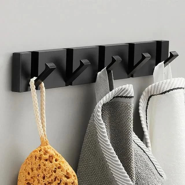 Diskret og plassbesparende veggkrok, elegant design for en ryddig gang eller bad, sammenleggbar.