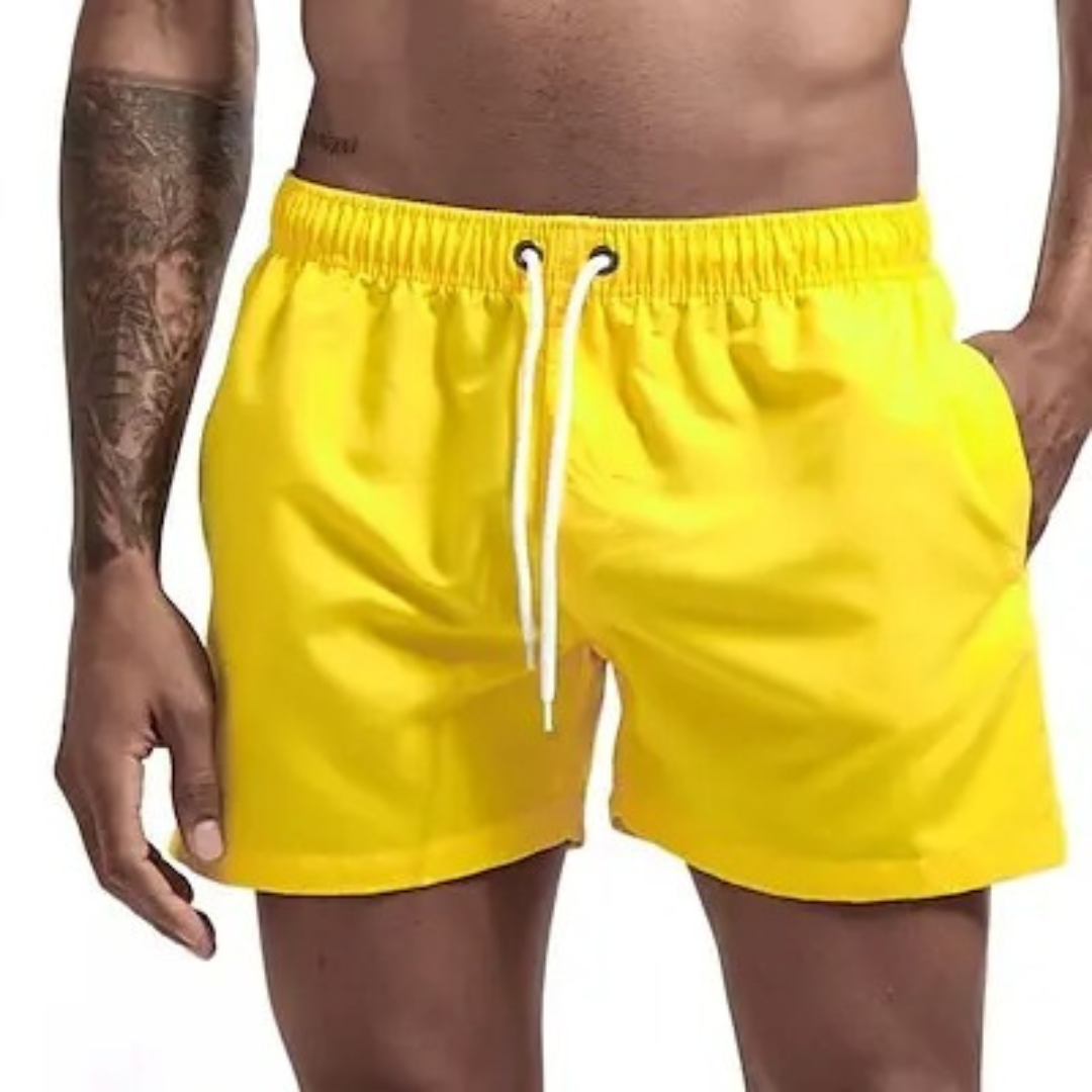 Blå herre badeshorts, hurtigtørkende, med praktiske sidelommer.
