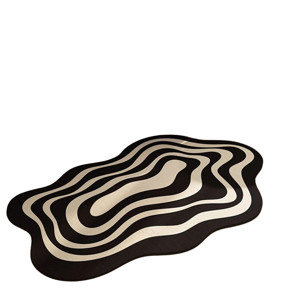 Sklisikker, moderne svart badematte med uregelmessig design for baderom. Absorberende og hurtigtørkende.