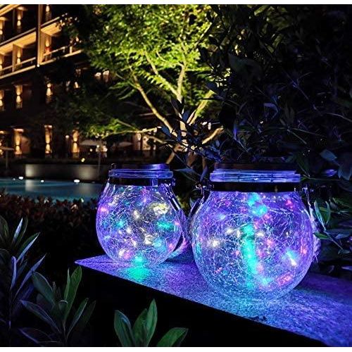 Dekorativ solcellelampe med sprukket glass og hampsnor, perfekt for rustikk hagebelysning.
