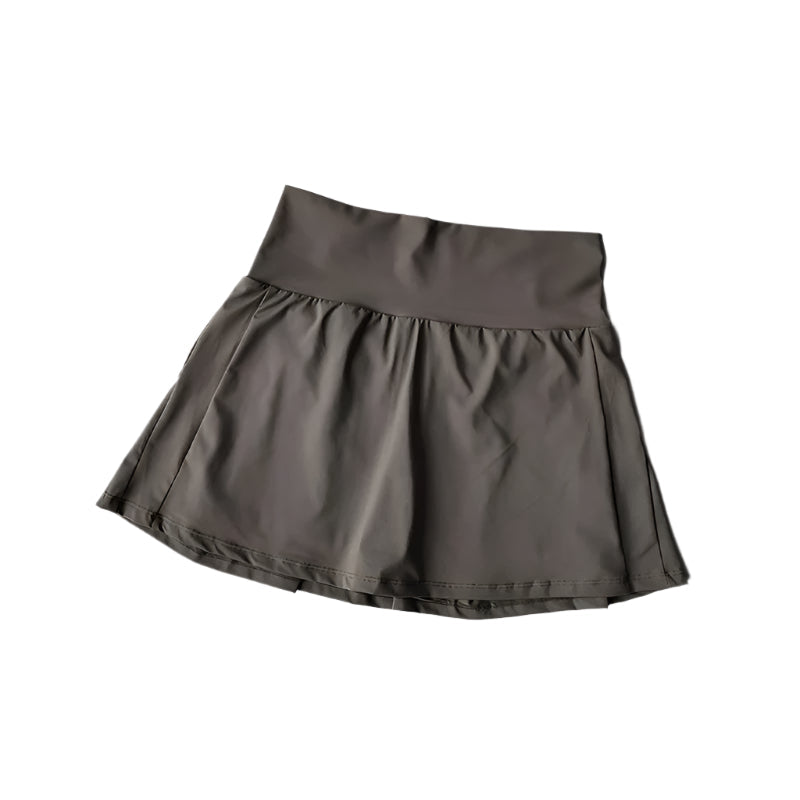 Komfortabel sportsskjørtshorts med høy midje for aktive kvinner. Ideell for yoga, trening og daglig bruk.