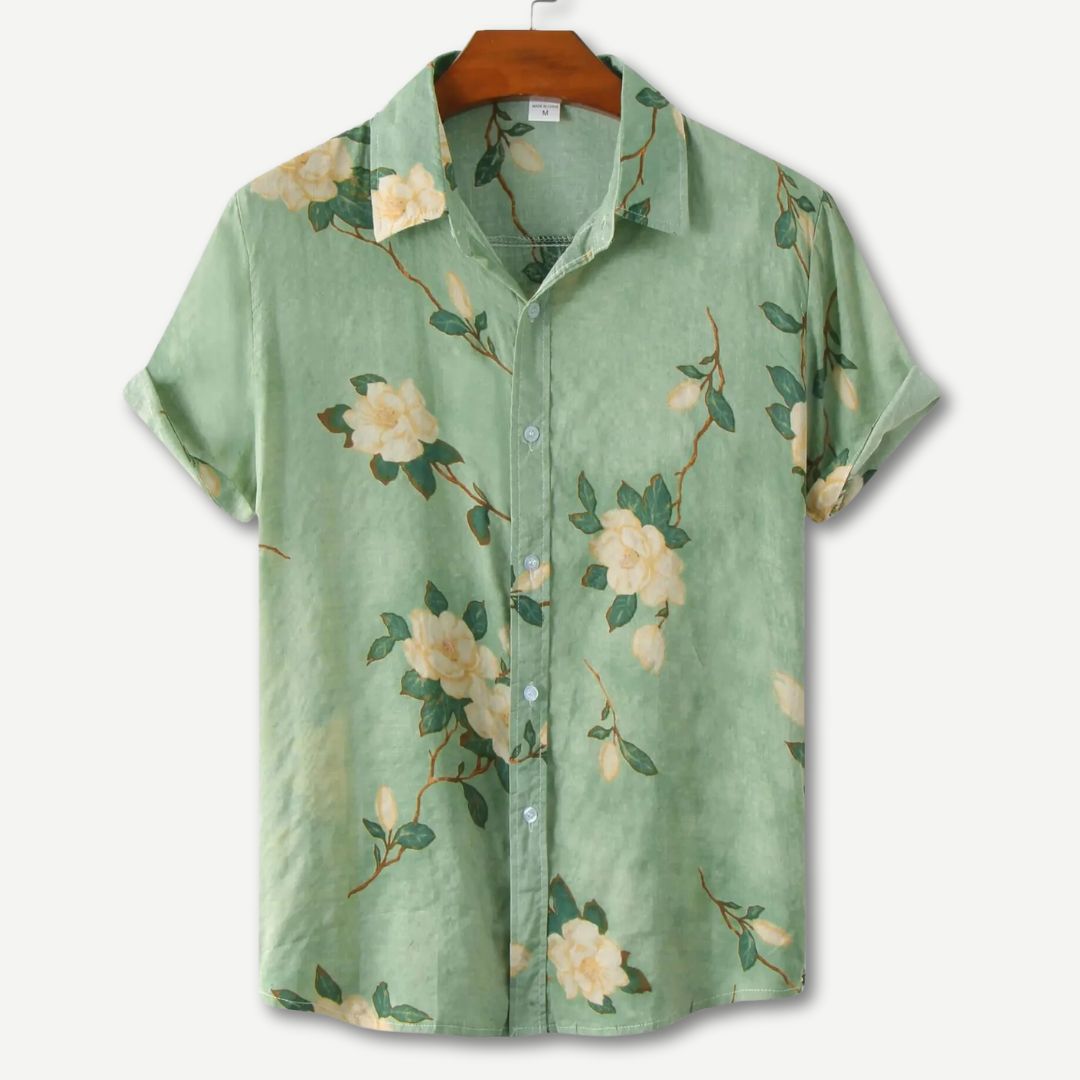 Casual herre t-skjorte med livlig blomsterdesign, ideell for en stilfull og komfortabel look i hverdagen.