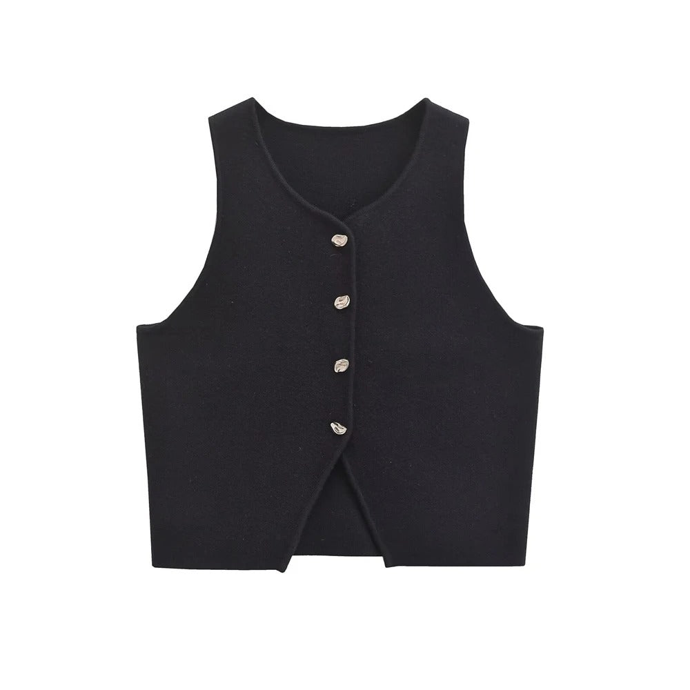 Komfortabel cropped strikkevest til kvinner. Elegant og moderne strikkevest med knapper.