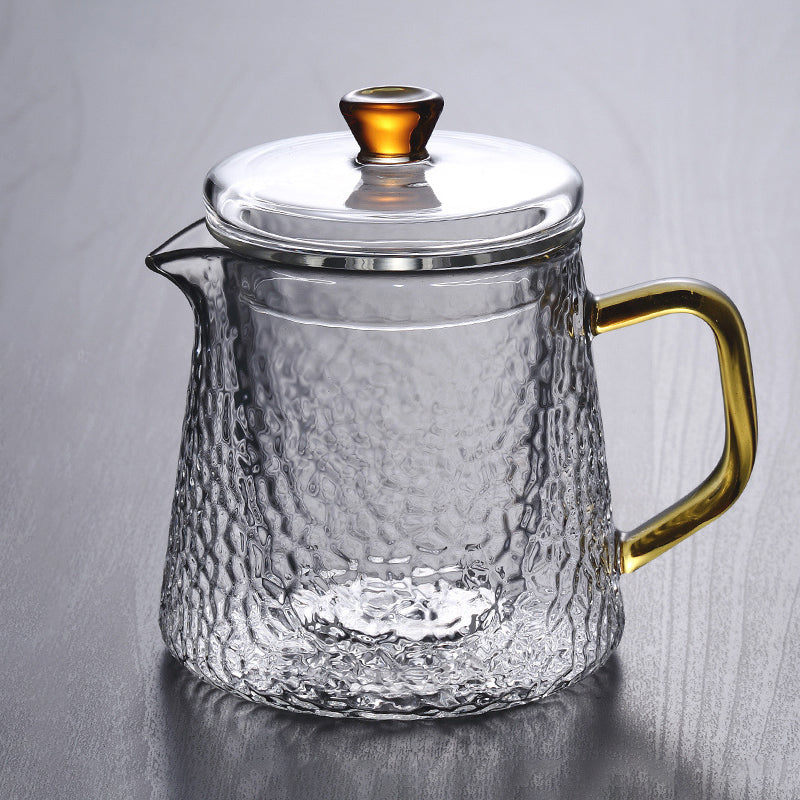 Transparent glasskanne for te, laget av borosilikatglass, med praktisk infuser.