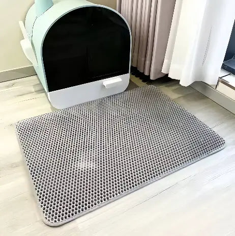 Effektiv kattesandmatte som fanger opp spredt sand og holder kattens område rent og pent.