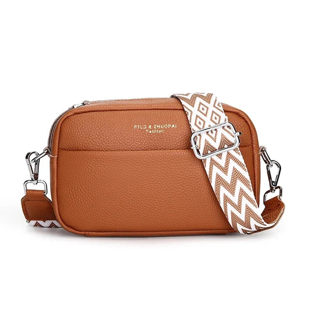Stilren blå skulderveske for kvinner, moderne crossbody-veske med solid glidelås.