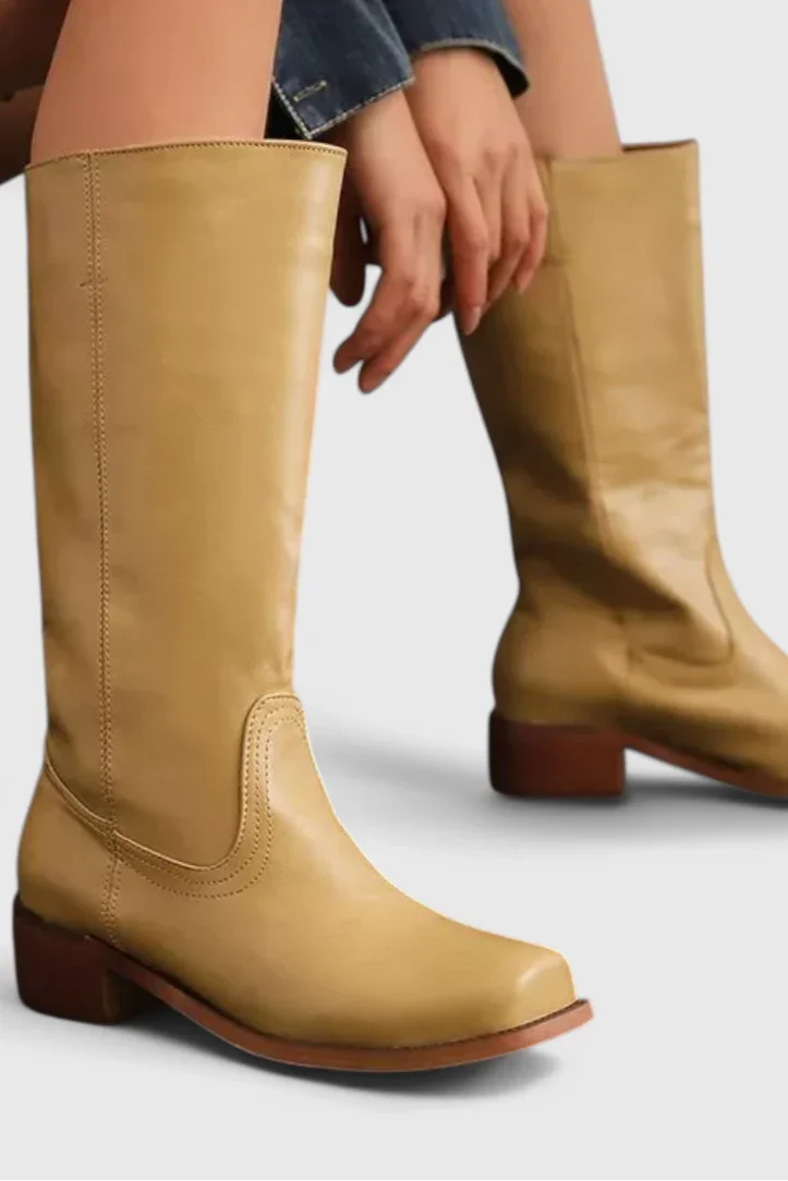 Elegant ankelstøvlett i skinn med detaljer. Klassisk damesko for allsidig kvinnemote.