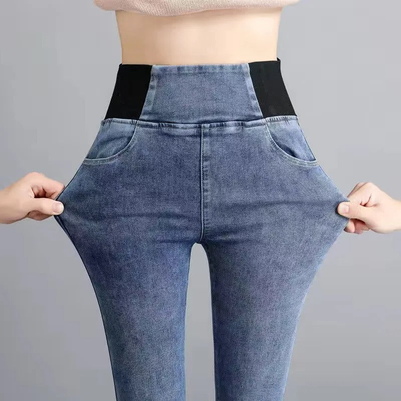 Blå høymidje skinny bukser for kvinner. Tett passform og stil, perfekt for enhver anledning.