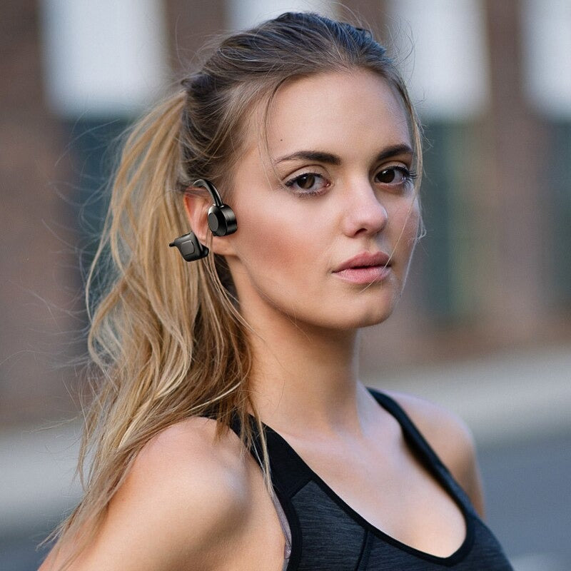 Letvekt unisex sportshodetelefoner med beinledning, sikrer musikk og åpen hørsel under all trening.