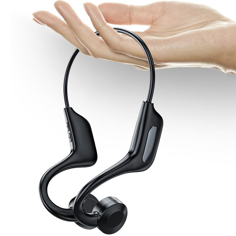 Hvite trådløse Bluetooth-hodetelefoner for sport, med beinledningsteknologi for trygg musikklytting.