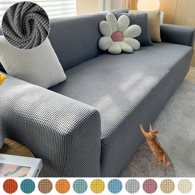 Trendy teksturert stretch sofatrekk som beskytter mot flekker og forlenger levetiden.