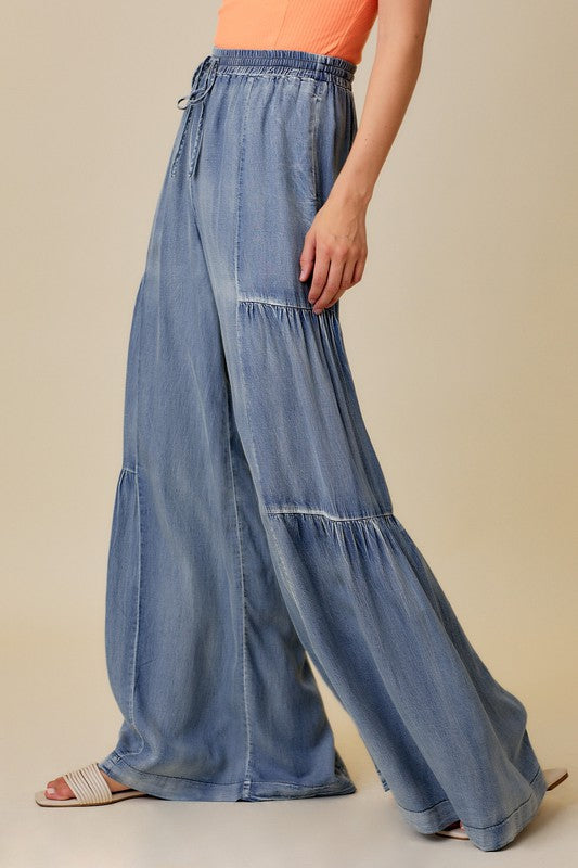 Volangbukser for dame; trendy, vide ben og vasket look. En stilige fritidsbukse med komfortabel passform.