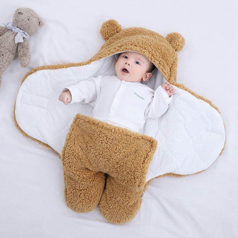 DIY baby sovepose i mykt garn, perfekt som gave.