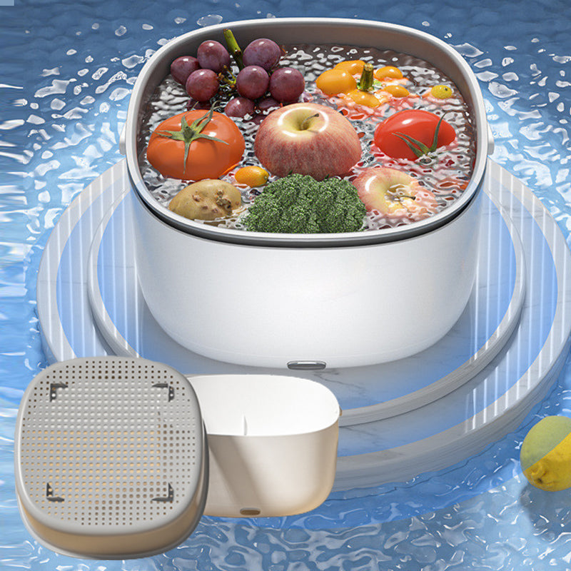 Kompakt ultralydvasker som hygienisk renser frukt og grønnsaker for sunnere måltider.