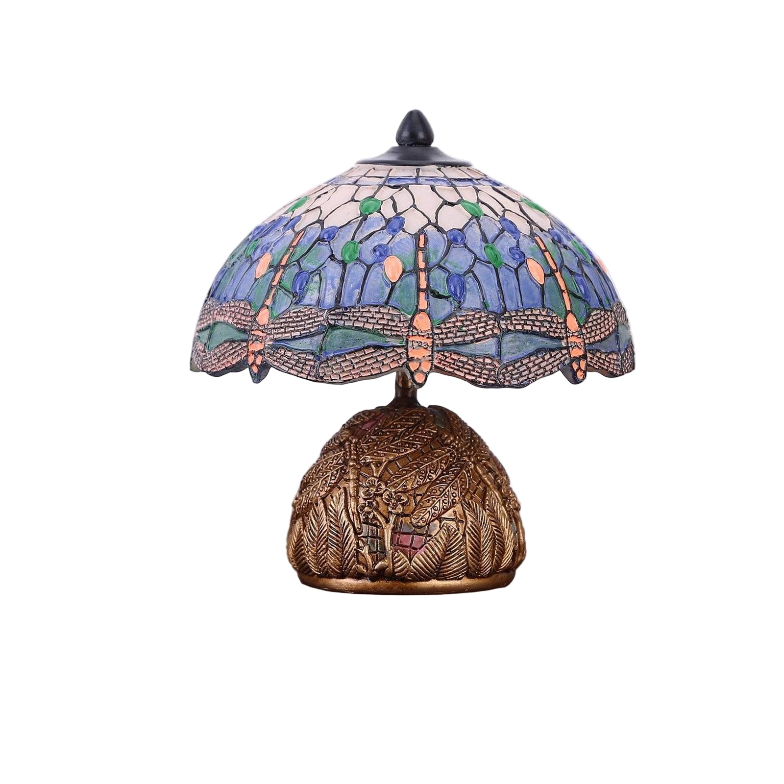 Unik vintage lampe med intrikat øyenstikkerdesign, gir varmt stemningslys til stuen.