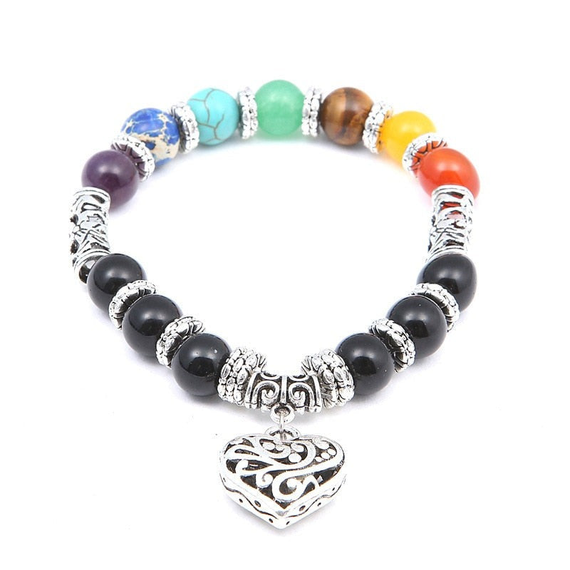 Unisex 7 chakra steinarmbånd med polerte krystaller for energi og balanse. Perfekt for velvære.