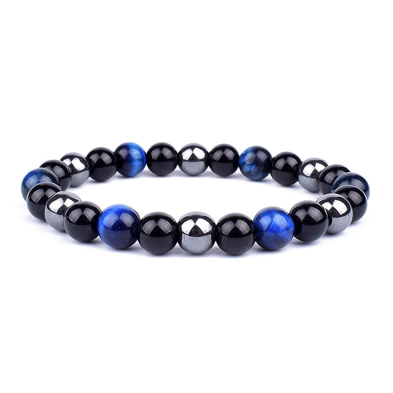 Krystallarmbånd med obsidian, tigerøye, hematitt. Gir healing, energi og chakra velvære. Stressreduksjon.