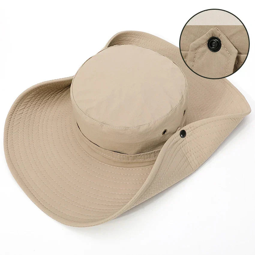 Unisex bøttehatt med justerbar hakestropp sikrer god passform og holder seg på plass under utendørsaktiviteter.