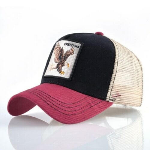 Baseballcap, unisex, med detaljert ørnedesign og justerbar stropp.