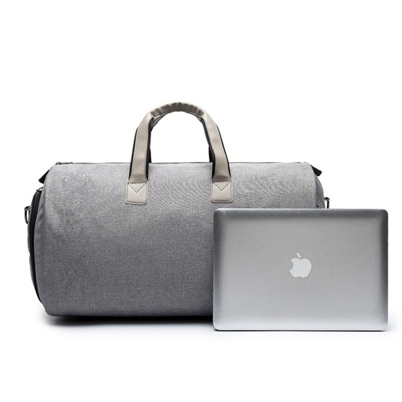 Organisert reiseveske i svart, med praktiske rom for enkel pakking. Unisex dufflebag for reise.