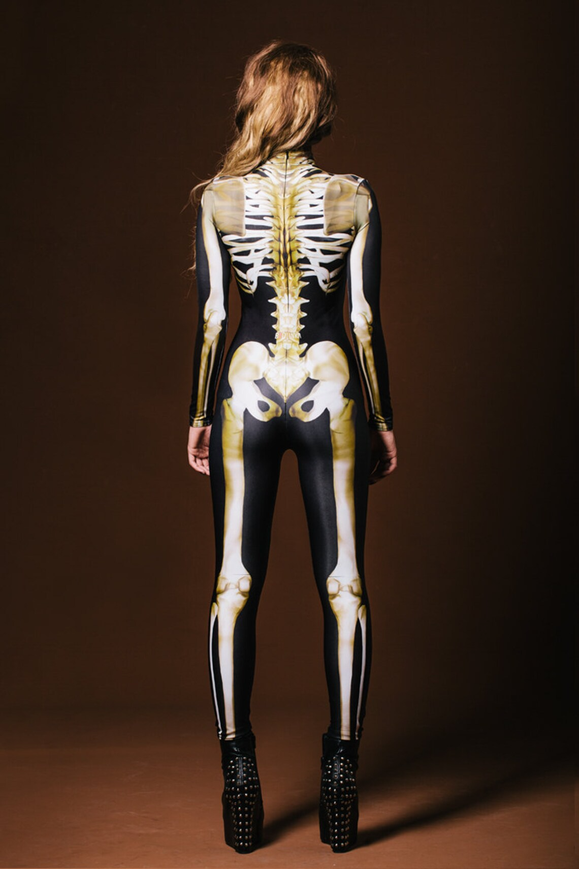 Morsomt unisex Halloween skelett kostyme. Et unikt glød i mørket antrekk for temafester.