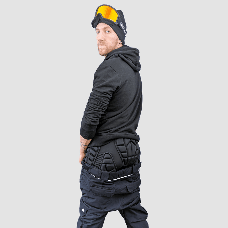 Sikkerhetsutstyr: unisex impactshorts som beskytter halebein og hofter under ski og snowboardaktiviteter.