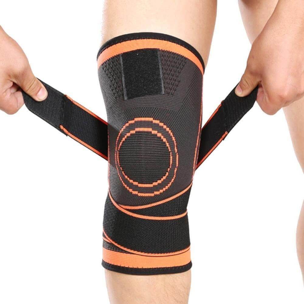 Detaljvisning av den pustende stoffstrukturen til en unisex knestøtte for optimal komfort under idrett og i hverdagen.