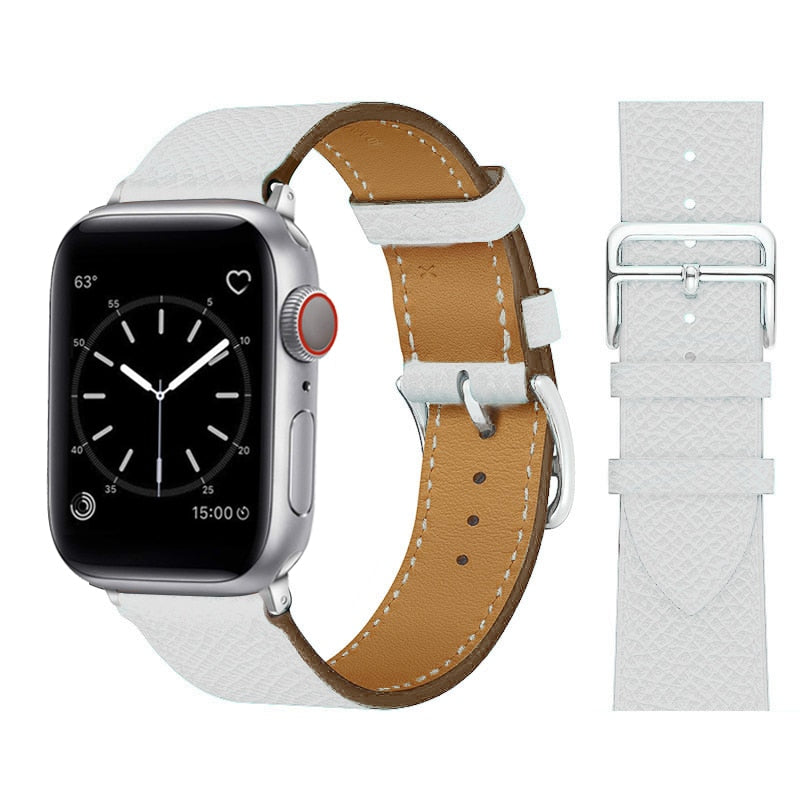 Nærbilde: Tekstur av det svarte kunstlærarmbåndet for Apple Watch, motetilbehør