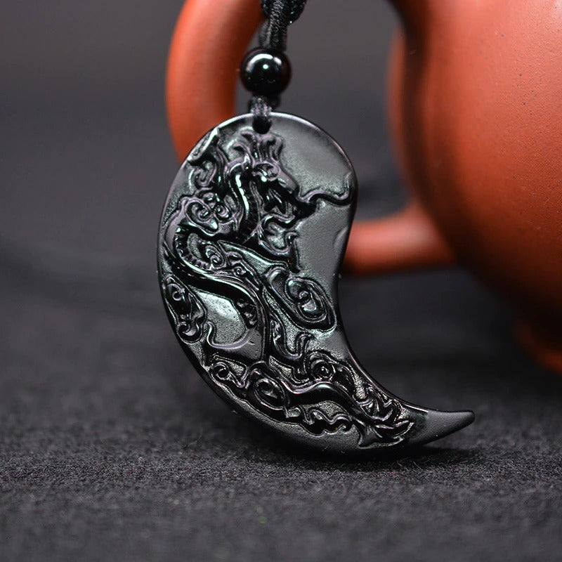 Svart obsidian halskjede, symboliserer balanse og positiv energi. Unisex naturstein for velvære.